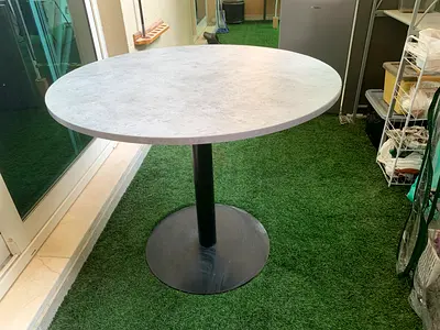Round cafe-style dining table