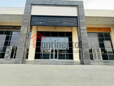 Prime Commercial Showroom for Rent in Industrial Area 12, Sharjah | Main Road Location Next to Petrol Station