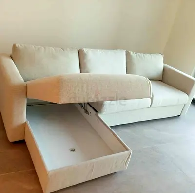 Light beige 3-seater sofa with under-seat storage, good condition