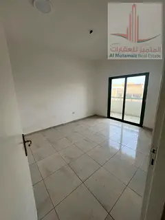 A well-maintained two-bedroom apartment is available for annual rent in Al Qasimia, Sharjah, in a pr