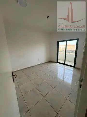 A well-maintained two-bedroom apartment is available for annual rent in Al Qasimia, Sharjah, in a prime location close to all essential services and