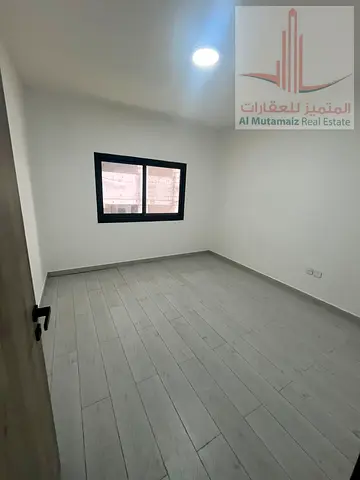 Brand New First-Occupancy Apartment for Rent in Al Nuaimiya 2, Abu Dhar Al Ghifari Street View, Hotel-Style Finishing, Covered Parking Near All Servic