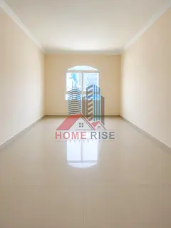 Faimly Living 2BHK With Wardrobes Balcony Free Parking, gym pool free, Near Ansar Mall Sharjah.