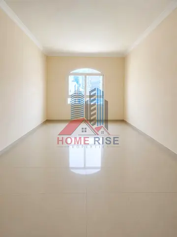 Faimly Living 2BHK With Wardrobes Balcony Free Parking, gym pool free, Near Ansar Mall Sharjah.