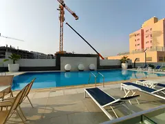 BRAND NEW BUILDING 1 BEDROOM APARTMENT WITH MAIDROOM 2 BATHROOMS GYM POOL PARKING ON PRIME LOCATION