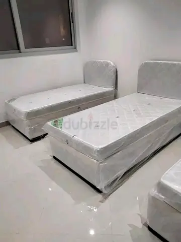 Two Single Beds with Mattresses - Good Condition