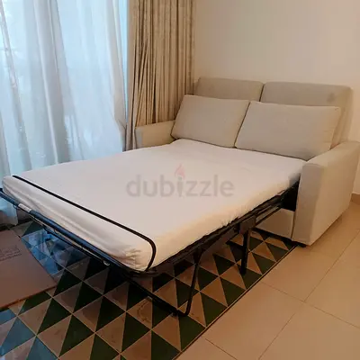 2-seater sofa bed with folding mattress