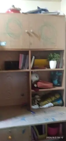 Used wooden study desk with storage hutch and shelves