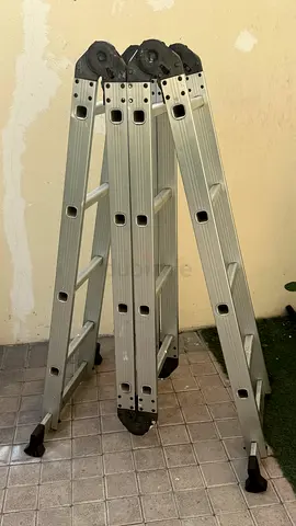 4‑Section Folding Aluminum Multi‑Purpose Ladder (Good Condition)