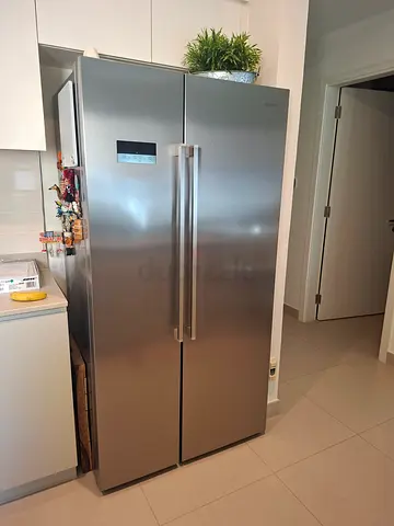 Smeg almost new side by side fridge
