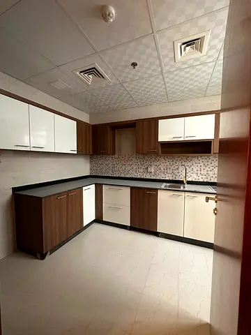 Two bedrooms, a living room, two bathrooms, central AC, built-in wardrobes, and FREE PARKING