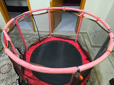 Kids mini trampoline with safety net - used abudhabi