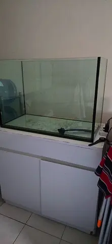 Crystall clear aquarium tank with cabinet length 80cms, height 59cms ,width 49cms.