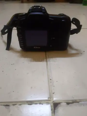 Used Nikon DSLR with strap - good working condition
