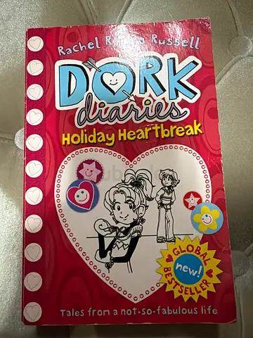 Dork Diaries: Holiday Heartbreak by Rachel Renée Russell (used)