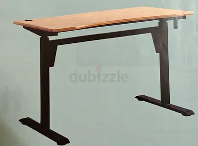 Adjustable standing desk with wooden top and metal legs