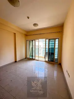 Two-Bedroom Apartments with Living Room for Annual Rent in Al Taawun, Near the Dubai Exit