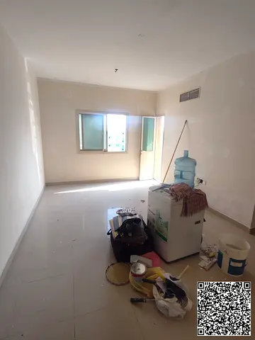 A well-located apartment is available for annual rent in Al Karama, Ajman, situated next to Al Rayyan Hotel. The apartment offers convenient access to