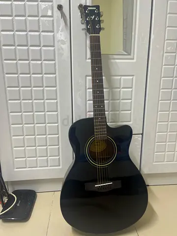 Black cutaway acoustic guitar - good condition