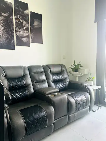 Gray Leather 2-Seater Recliner Sofa in Good Condition