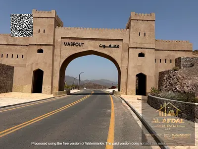 عروض  ارض للبيع بمصفوت سكنى زاوية شارع وسكة موقع ممتاز