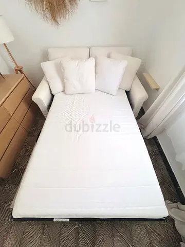 White fabric  sofa bed with cushions - compact daybed