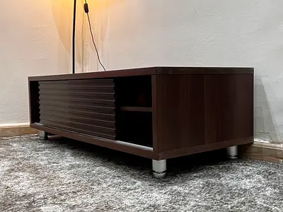 Dark wood TV cabinet/entertainment unit with sliding front