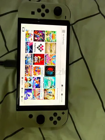 Nintendo Switch OLED with Games - White Joy‑Cons, Good Condition