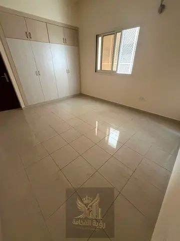 For rent in Al Majaz 2 two bedroom apartment with living room 2 bathrooms balcony free maintenance deposit deferred for two months and 4 or 6 payments