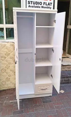 Double door cabinet selling brand new