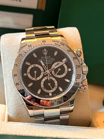 Rolex 116520 year 2016 box and papers.