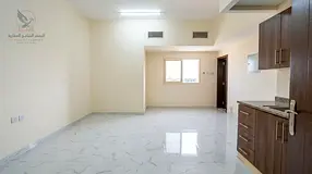 For annual rent Spacious studio apartment in Al Nuaimiya 2 Ajman Central air conditioning semi-separ