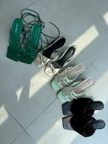 Three pairs of women's sandals — mixed styles, gently used