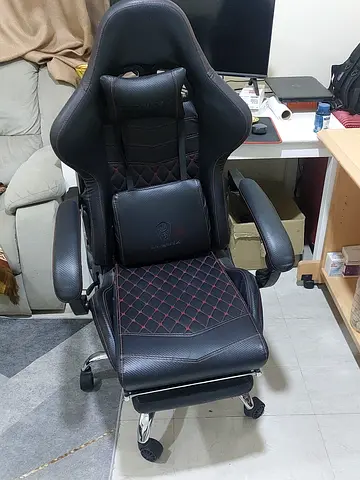 Used Ergonomic Gaming/Office Chair with Footrest, Black with Red Stitching in a very good condition