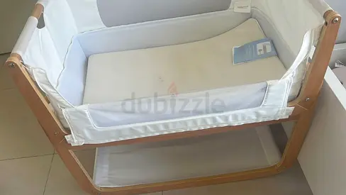 Baby Bedside Crib. Provides relief for babies with colic with its rocking mechanism, keep baby safe