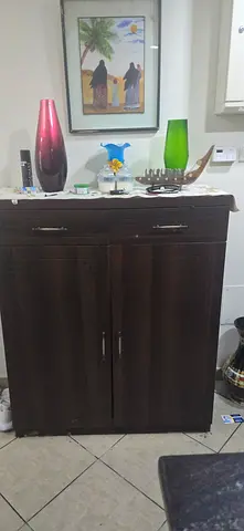 Dark wood 2-door cabinet with drawer - good condition