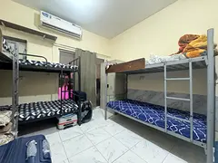 Boys bed space available in near karama day to day reddy to move in