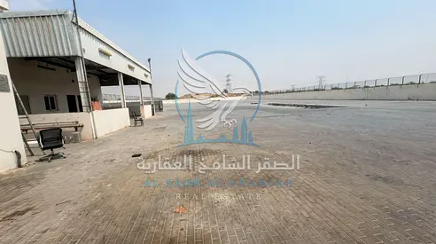 Yard for Rent in Al Sajaa | 60,000 sq. ft. | Offices, Kitchen, Covered Area | 50 kW Electricity