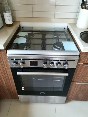 Stainless Steel Gas Range with Electric Oven - Very Good Working Condition