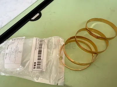Set of 4 Gold Toned Bangle Bracelets
