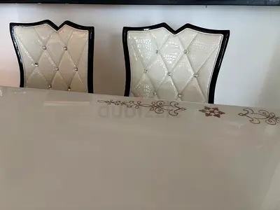 Marble dinning table with 6 leather stones graved chairs