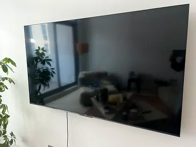 Large Wall-Mounted Flat Screen TV