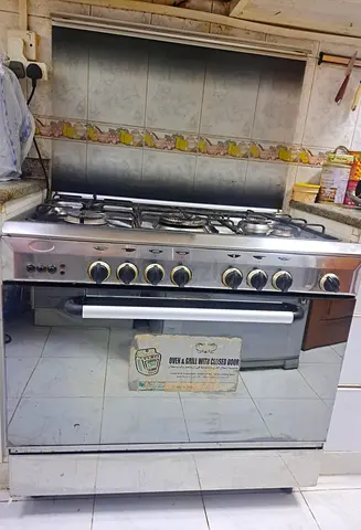 Stainless Steel 5-Burner Gas Range with Built-in Oven - Good Working Condition