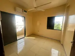 AED 30,000 Per Year | 2-Bedroom Apartment with Living Room for Staff Accommodation in Al Rumailah