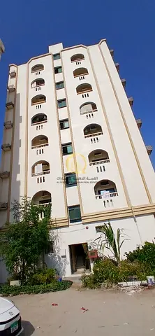 Building for sale in Al Butina; 3,100 sq. ft. area, comprising a ground floor and 7 upper floors; c
