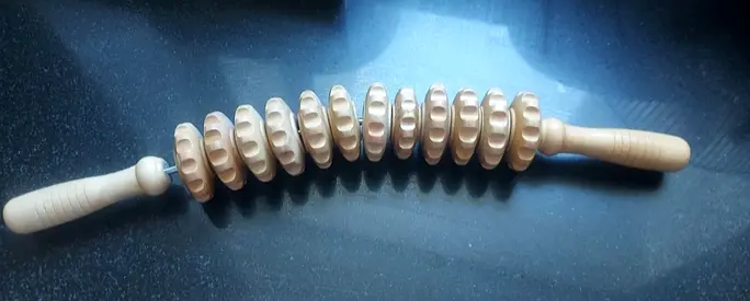 Wooden roller massage