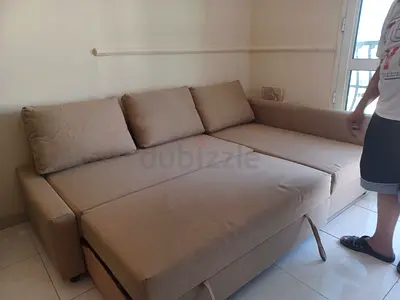 Beige L-shaped Sofa Bed - Convertible, Good Condition