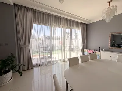 Light grey full-length black out curtains with sheer lining