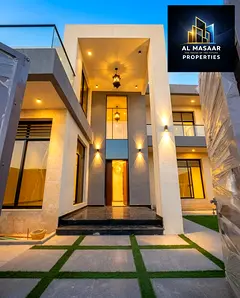 Luxury villa on a 5,000 sq ft plot with a 6,705 sq ft built-up area. Two floors plus a roof terrace.