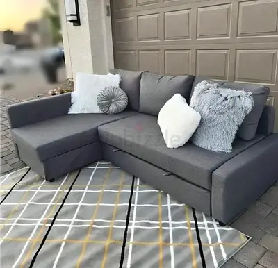 Grey L-shaped Sofa with Chaise and Storage - Good Condition